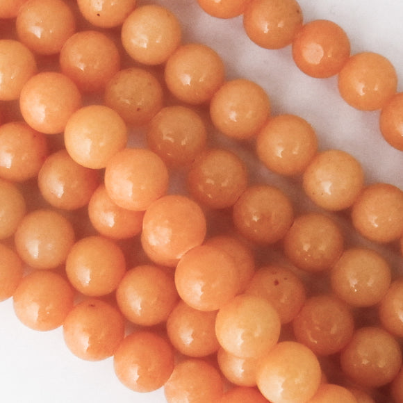 Semi prec 6mm rnd dyed op jade peach 65pcs