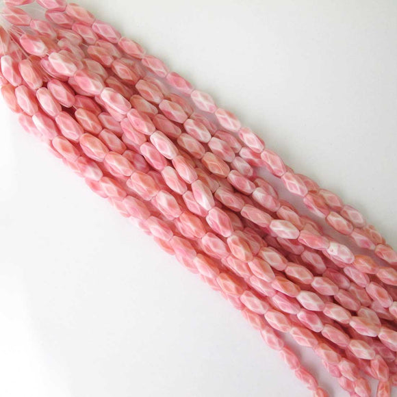 Cz 12x7 faceted rec2t opq rose whit 16pc