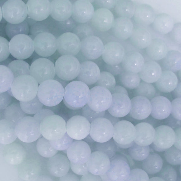 Semi prec 8mm rnd dyed jade ice blue 53p.