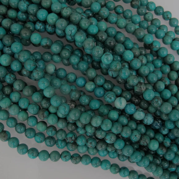 Semi prec 6mm rnd howlite drk turq 63+p.