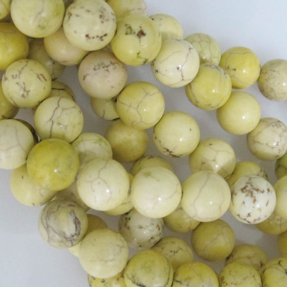 semi prec 10mm rnd hite lgt yelllow 40+p