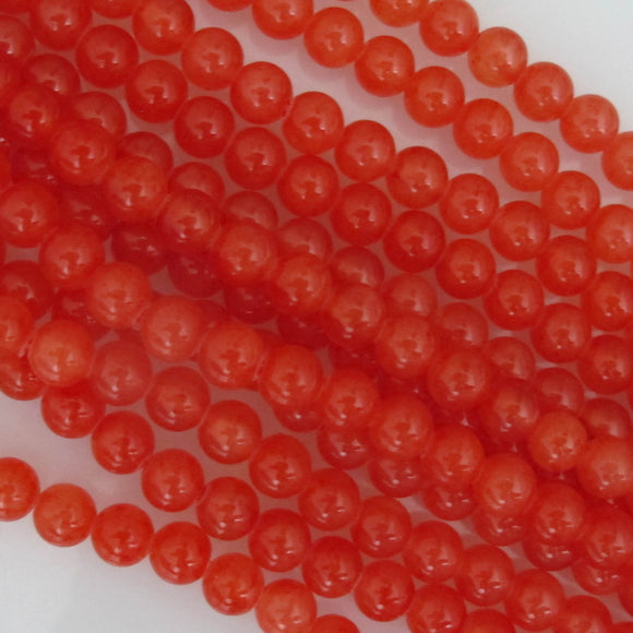 Semi prec 6mm rnd dyed jade li papaya 63