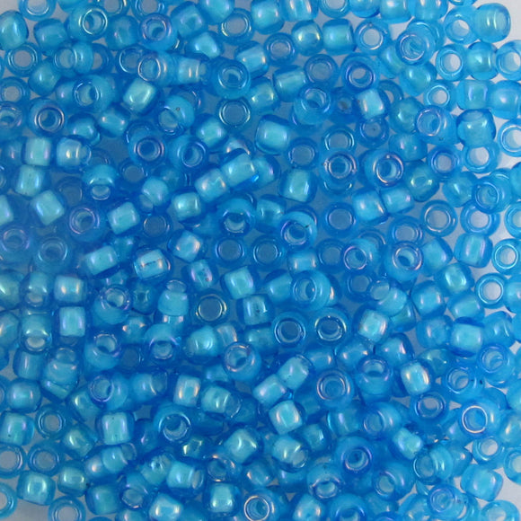 Toho #8 931 rnd aqua ins lin white 10g