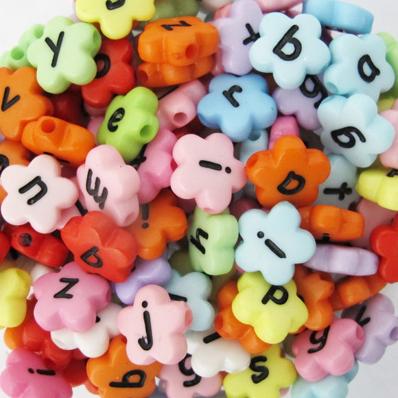 Plas 10mm Flower Black on Multi Col 115p