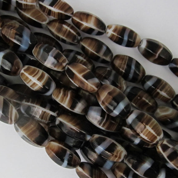 Cz 11x7mm oval 6sided 3t brown 18pcs