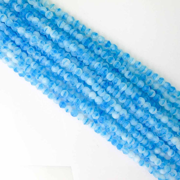 Cz 7mm rd facet 3 tne blue/white/clr 60p