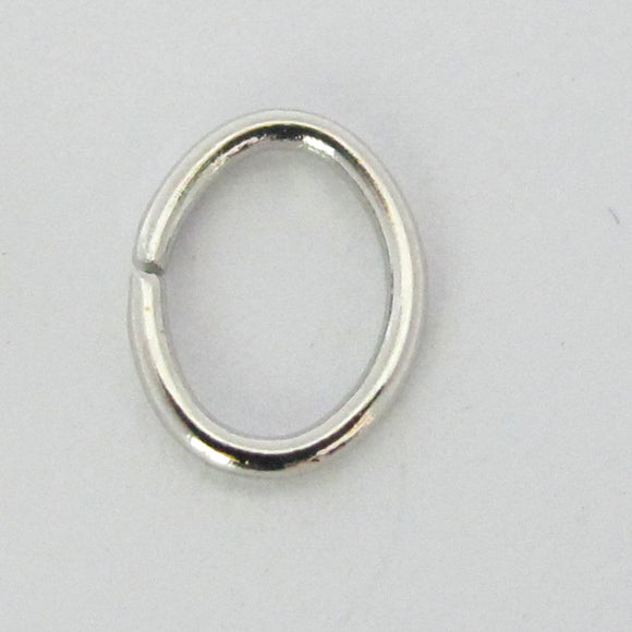 Metal 9x7x1mm oval jumpring NF nkl 20pc