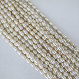 Semi prec 8x6mm rice pearl natural 46pcs