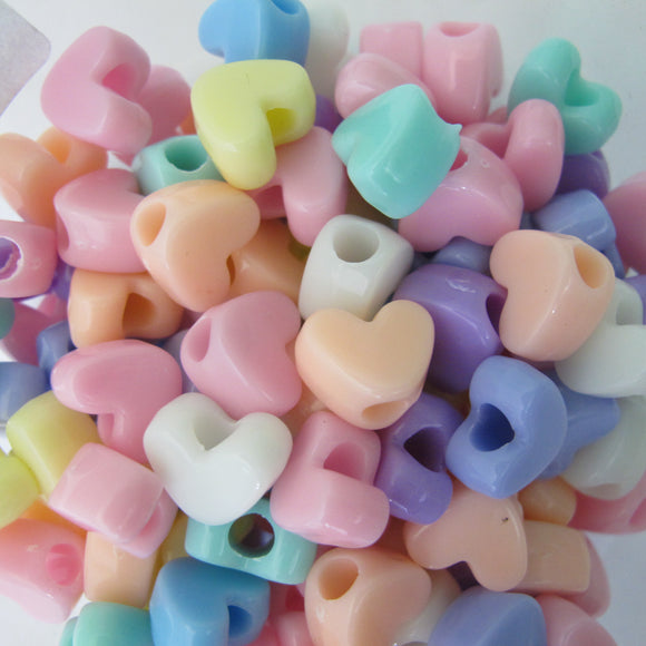 Plas 8x11mm heart 4mm V.hole pastel 110p