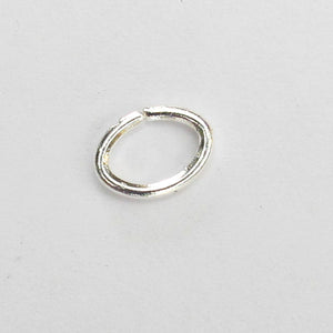 Metal 8x5x1mm oval jumpring NF SIL 50p