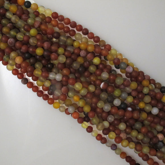 Semi prec 8mm rnd qtz dyed mat amber 38