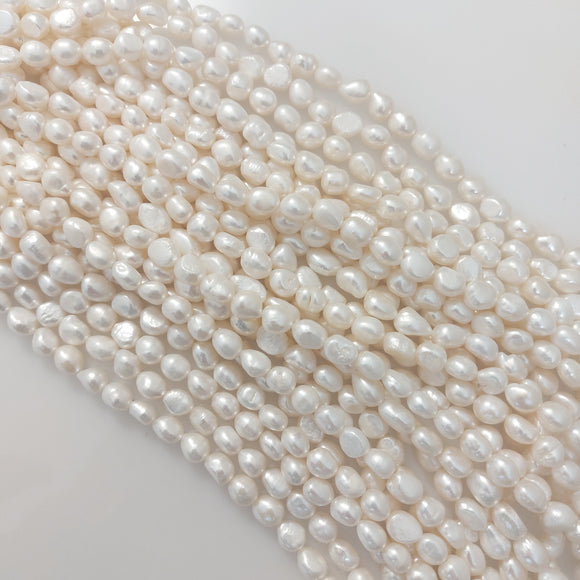 Semi prec 10x8mm baroque natural 34+pcs