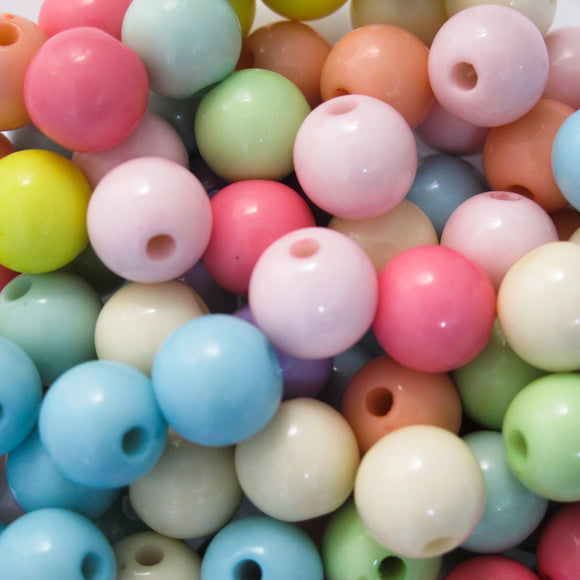 Plas 10mm rnd 1.5mm hole pastel 90+pcs