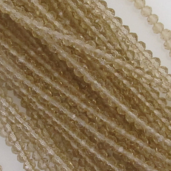 CG 3x4mm faceted rondel trans champ 120p