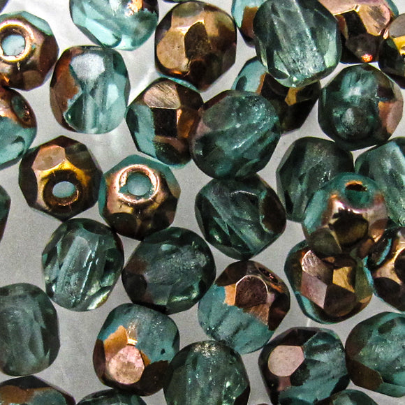 Cz 4mm rd facet trns drk tour gld AP50p